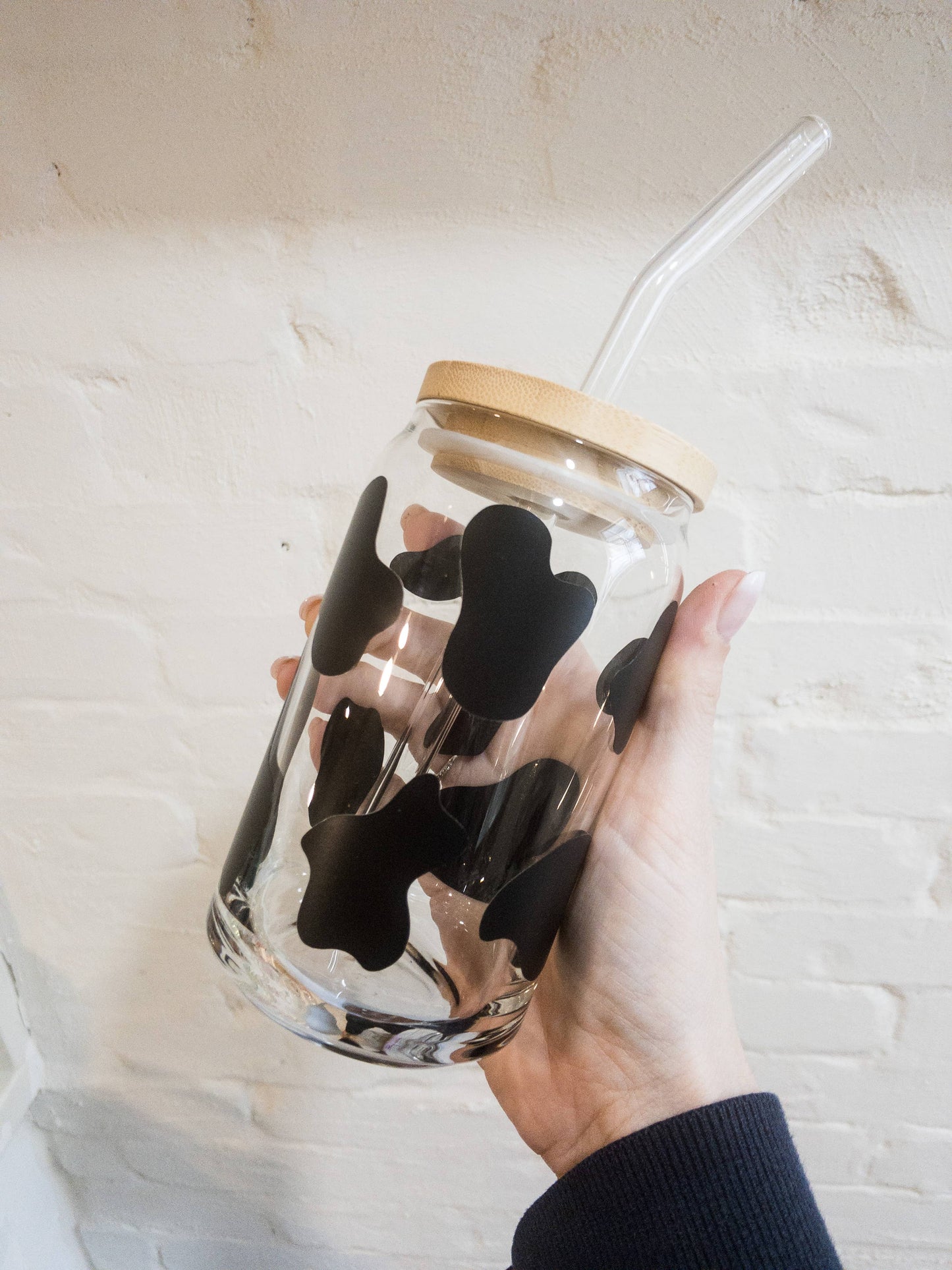 Cow print iced coffee glass; bamboo lid and glass straw