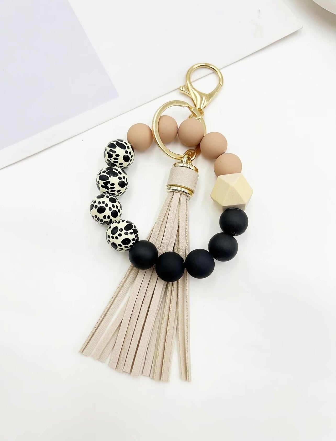 Cream Paw Print Rubber Beaded Keychain